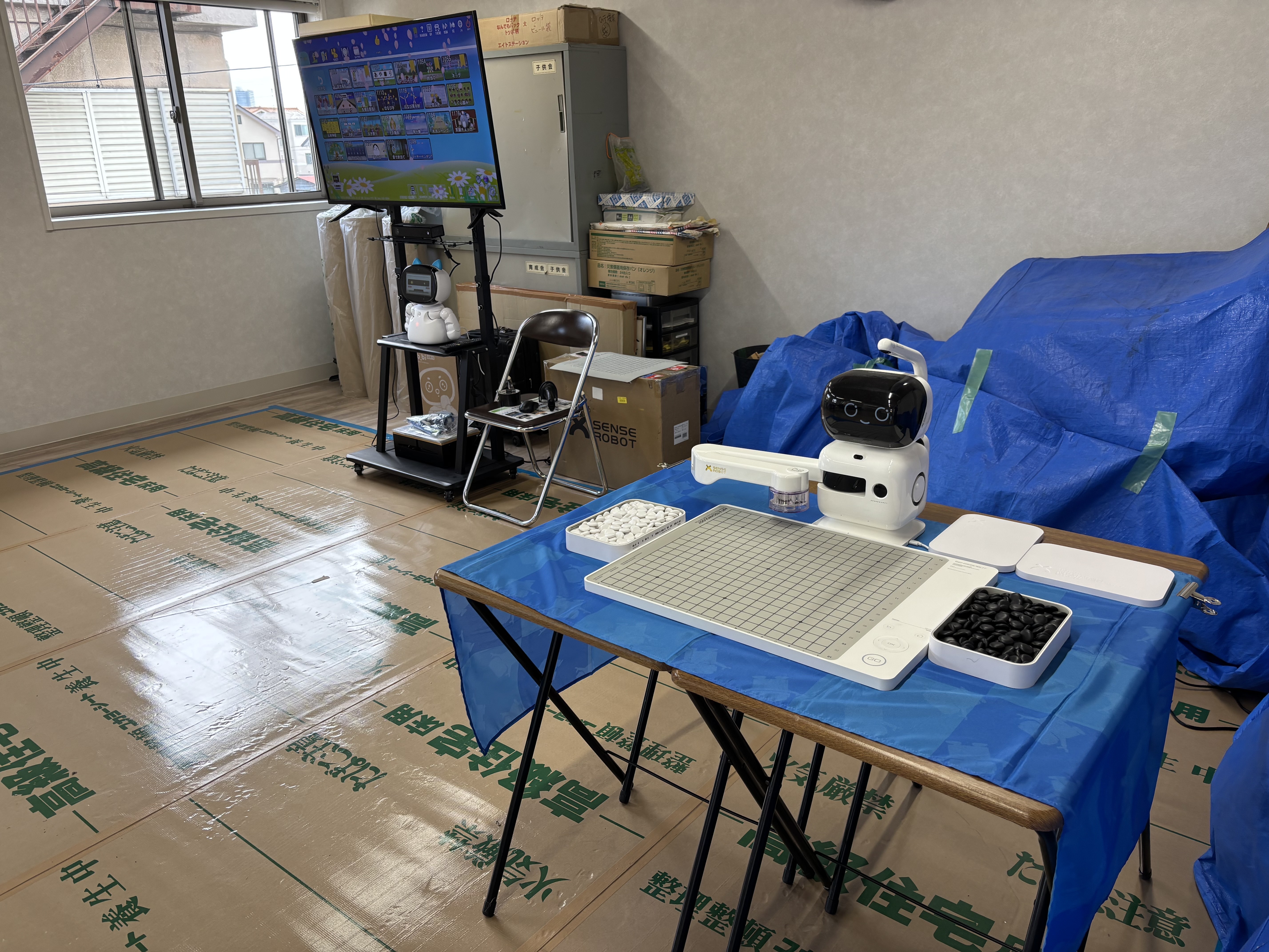 TANOとAI囲碁ロボットの設置の様子